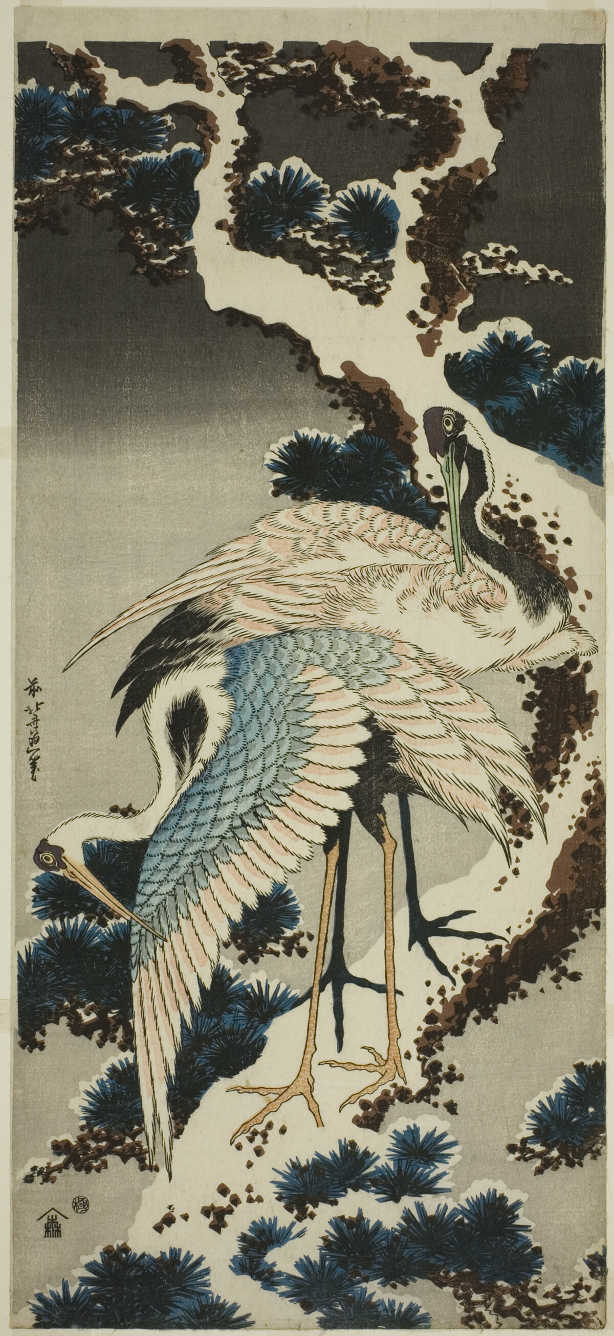 A pair of cranes perched on a snow-covered pine branch, from Katsushika Hokusai's 1834 nagaban woodblock print.